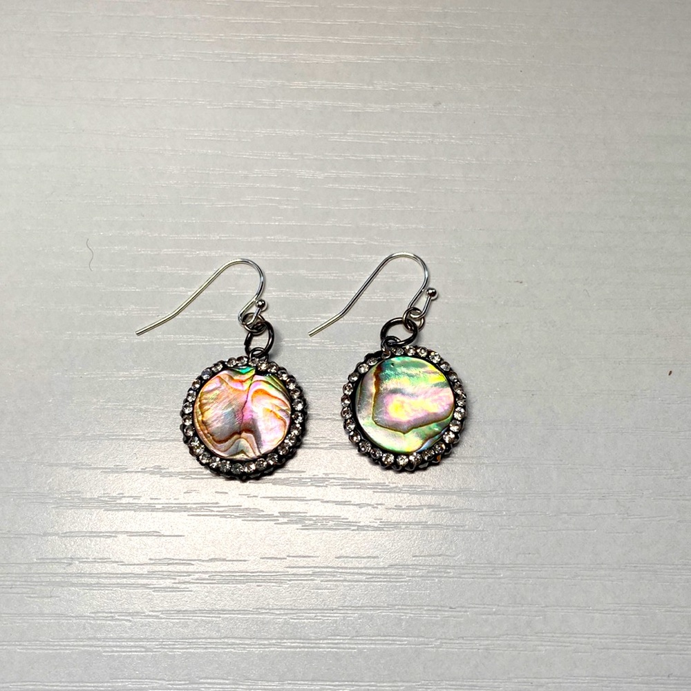 Handmade double sided shell earrings.